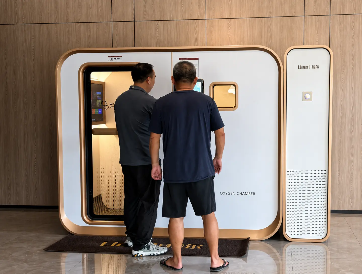 Ueerl room-style hyperbaric oxygen chamber arranged in a private home wellness room