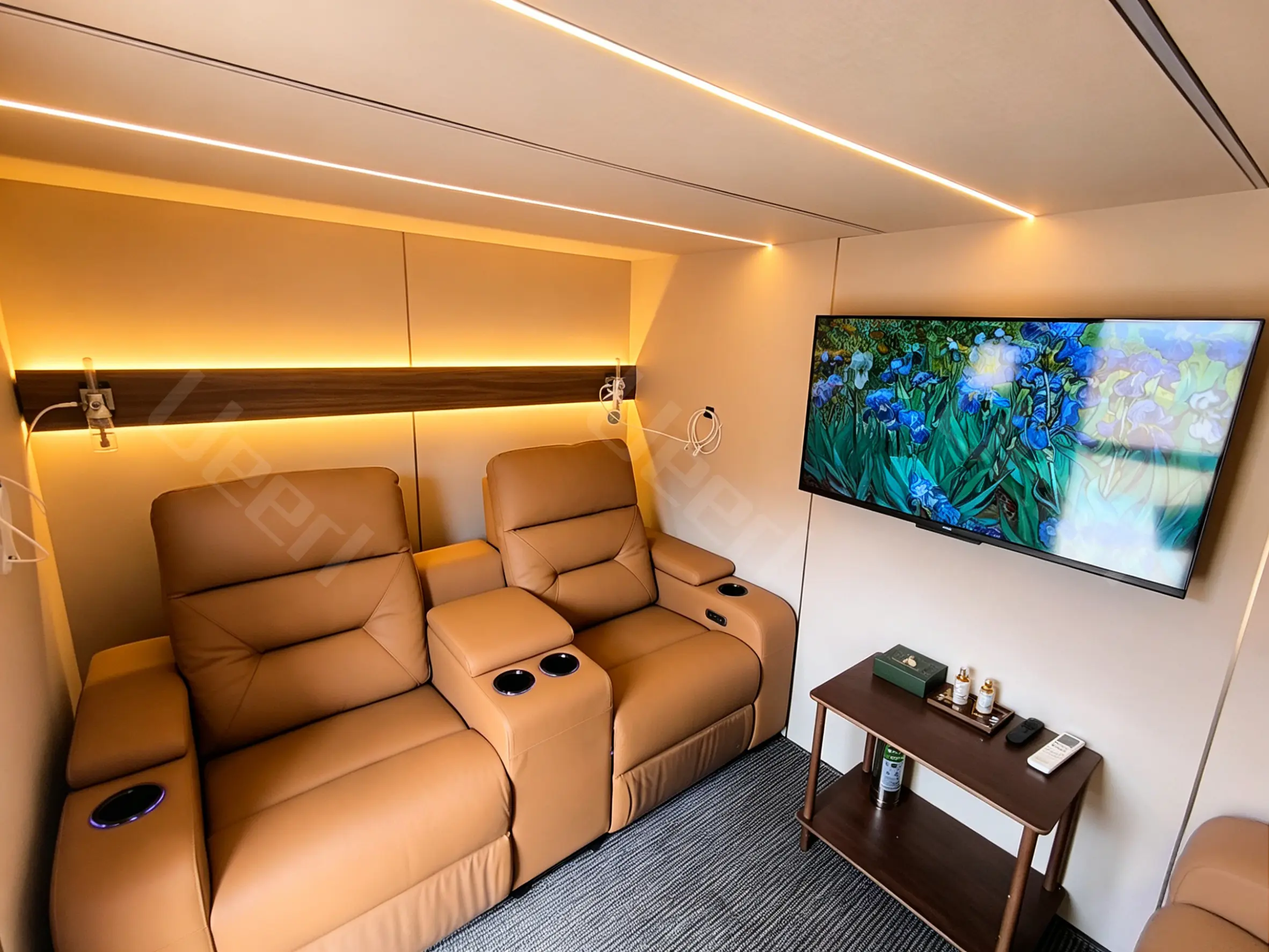 Reclining seating and integrated entertainment inside a two-person Ueerl home chamber