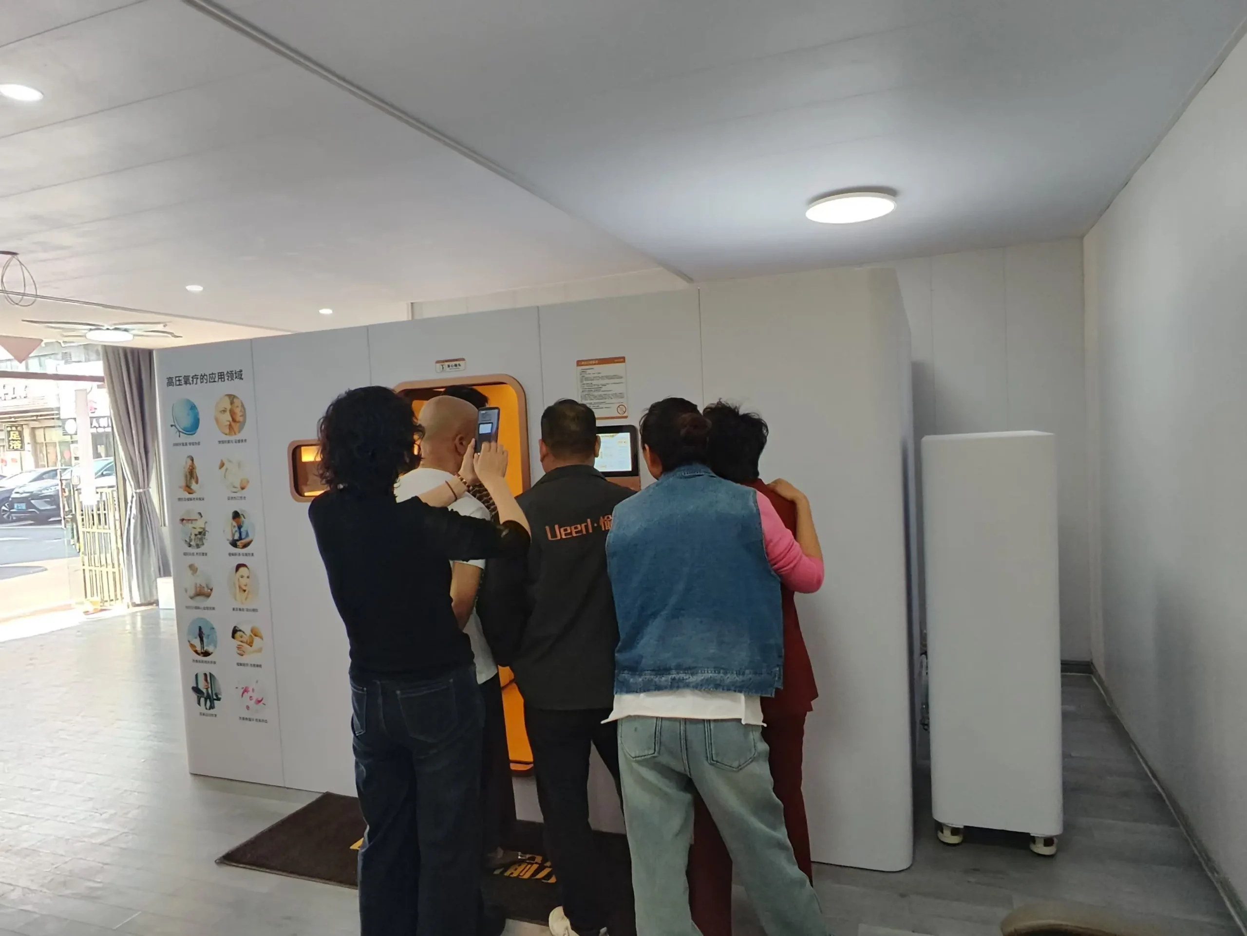 Ueerl technician demonstrating chamber controls during staff operation training