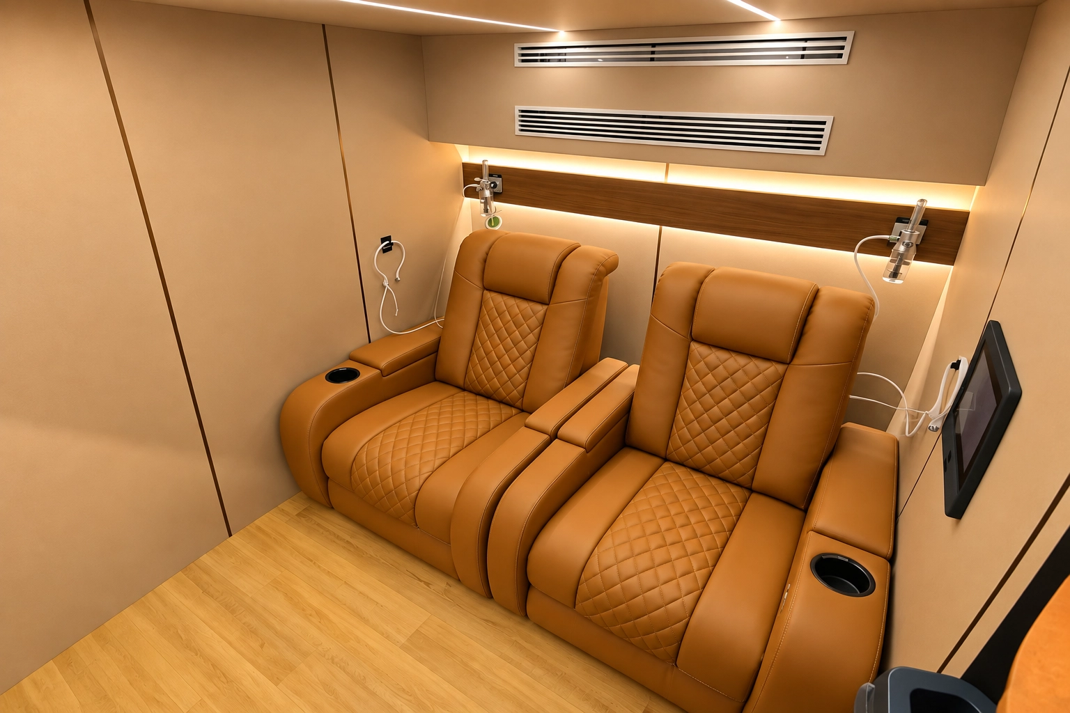 Ueerl chamber interior showing seats, armrests, floor, ventilation grilles and touchscreen